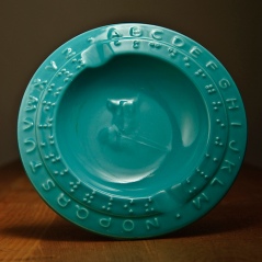 Children's bowl with Braille and upraised letters.