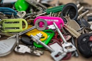 A pile of keys of different sizes and colors